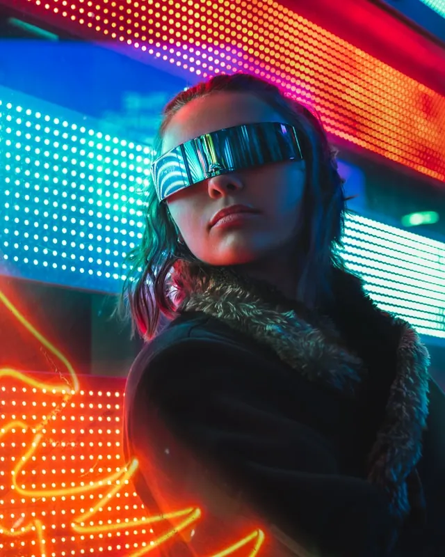 Portrait lit by neon lights